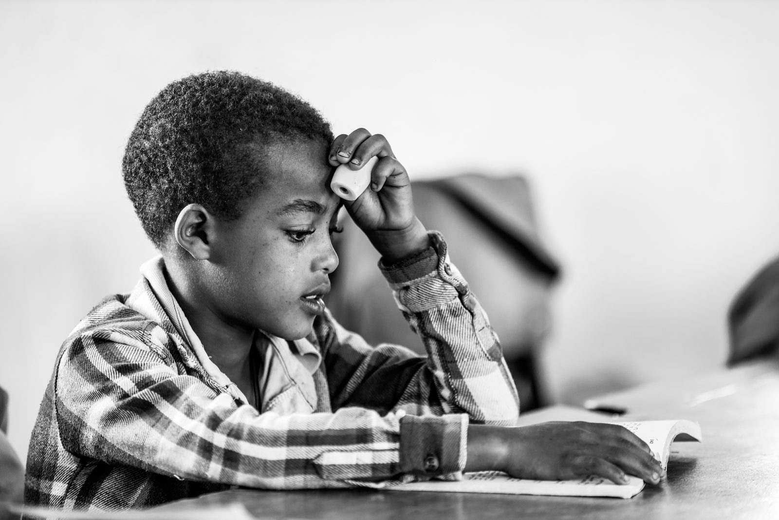 Student reading a distributed textbook